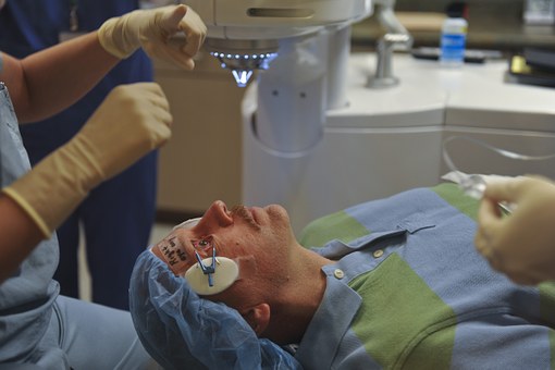 man getting an eye surgery