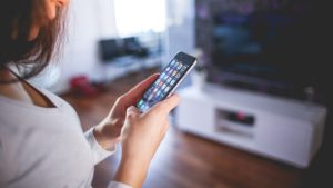 girl using an iPhone